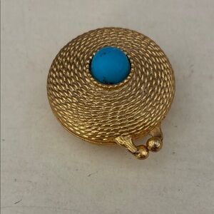 Estée Lauder solid perfume compact, round in a rope design.Turquoise stone.